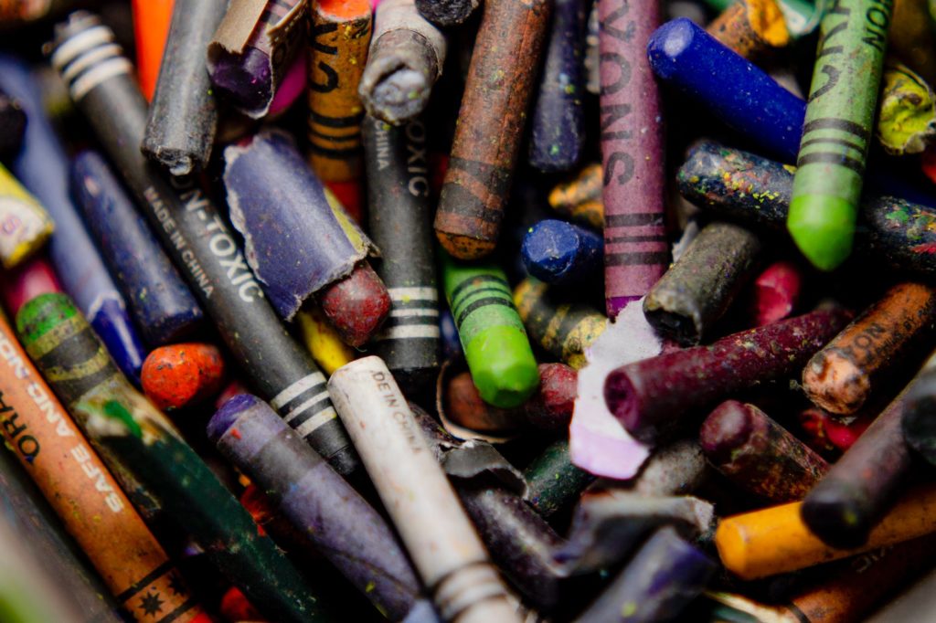 A pile of broken crayons