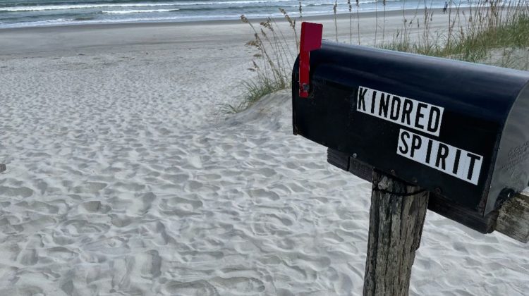 Mailbox with Kindred Spirit on it by the ocean