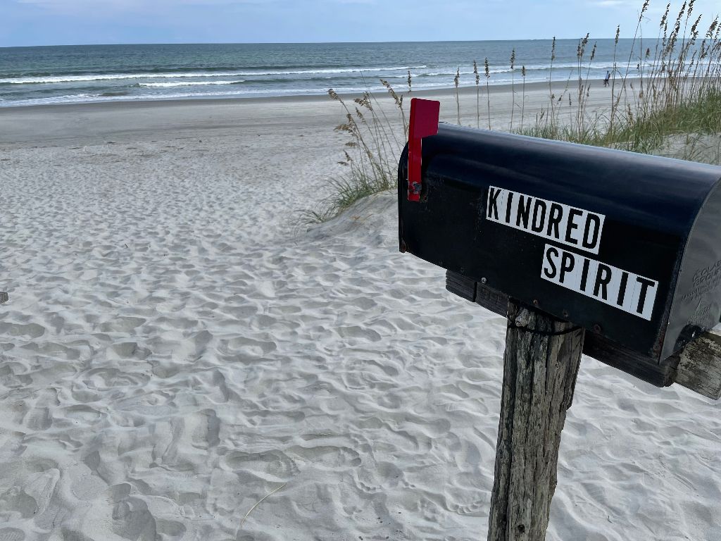 Mailbox with Kindred Spirit on it by the ocean