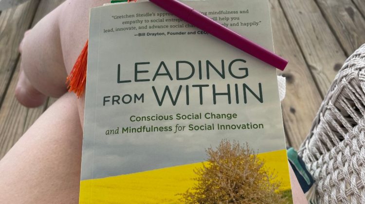 Leading From Within book on lap
