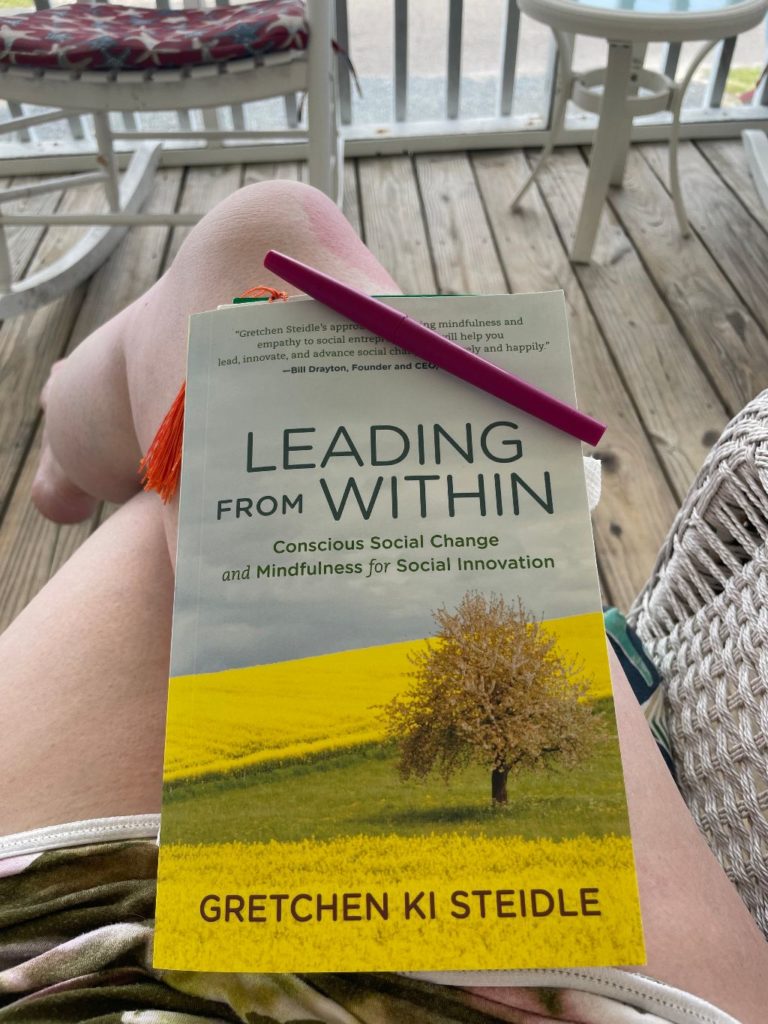 Leading From Within book on lap