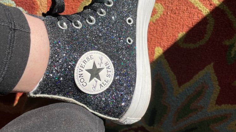 black glittery high-top tennis shoe