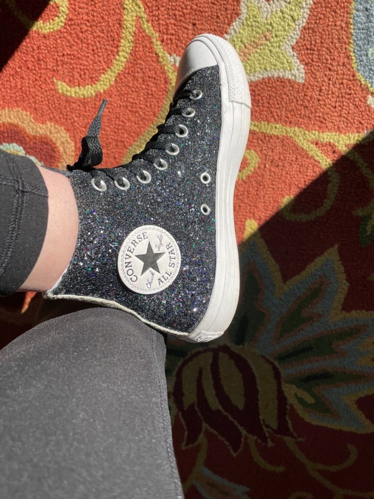 black glittery high-top tennis shoe