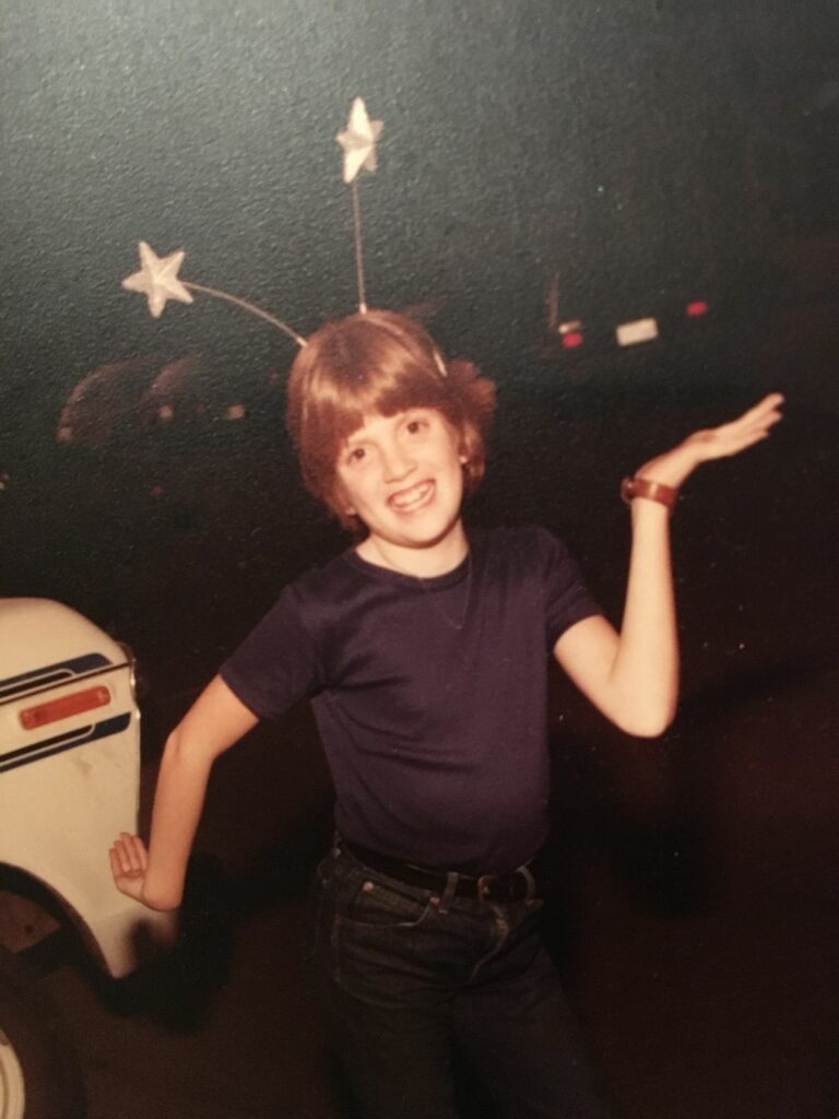 Emily in headband with stars