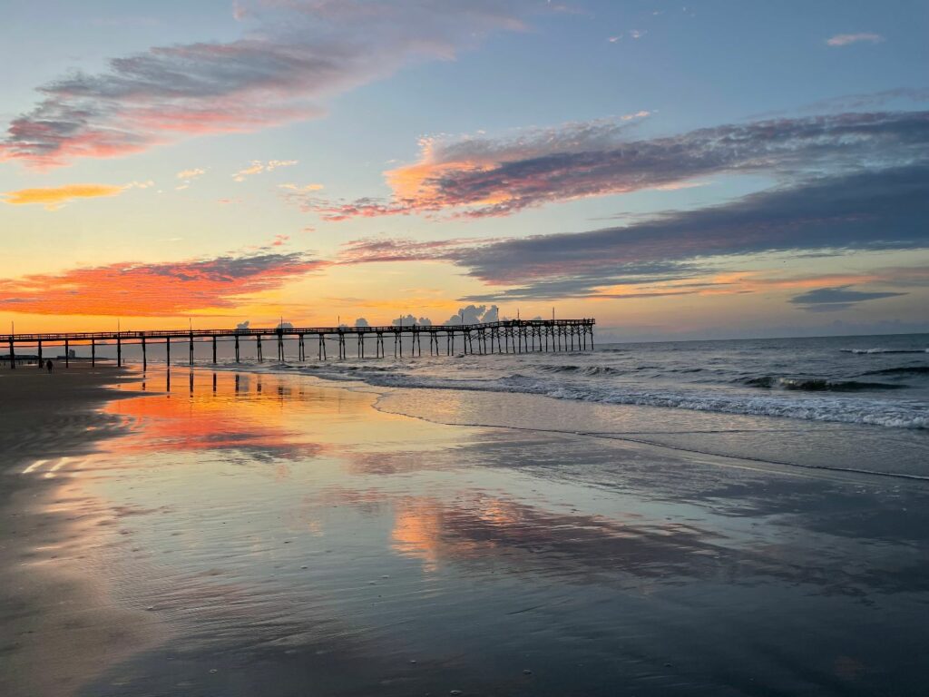 sunrise at the beach on the water