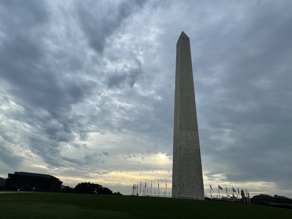 Washington Monument with a cloudy sky