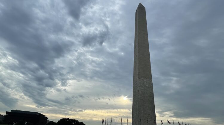 Washington Monument with a cloudy sky