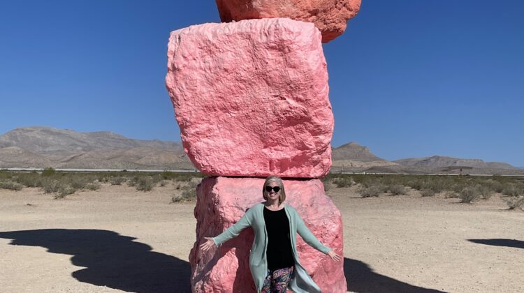 Emily in front of "Seven Magic Mountains" stacked stone statue